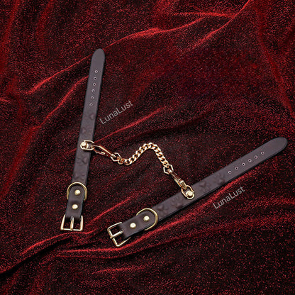 Temperature sensitive cat paw print BDSM handcuffs.