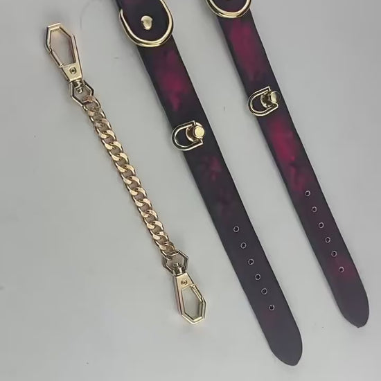 Temperature sensitive cat paw print BDSM handcuffs.