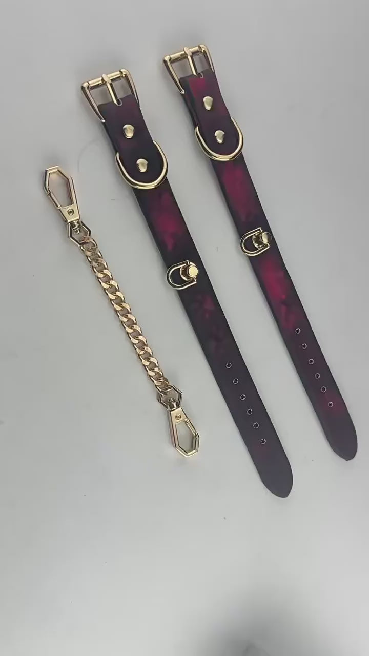 Temperature sensitive cat paw print BDSM handcuffs.